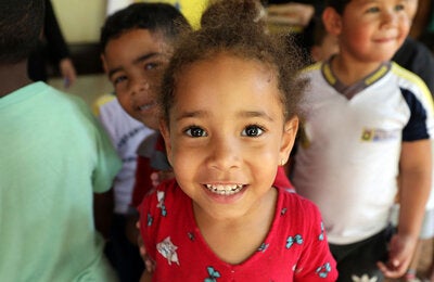 Children participating in Vaccination Week campaigns in Brazil