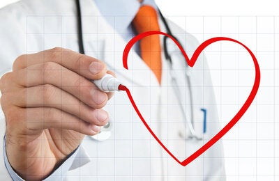 Doctor drawing heart