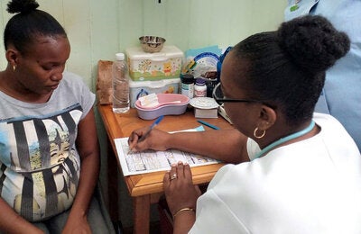Pregnant woman receiving prenatal care