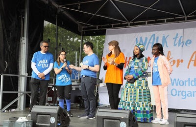 Personalities on the stage at Walk in Geneva