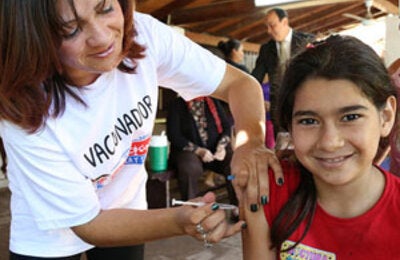 Girl getting vaccinated