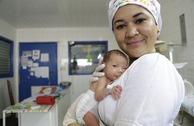 Nurse holding a newborn