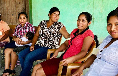 Group of women sitting outdoors