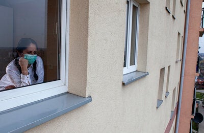 Woman looking out the window
