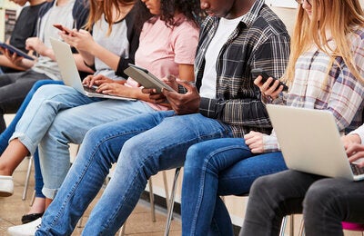 Young people on mobile devices