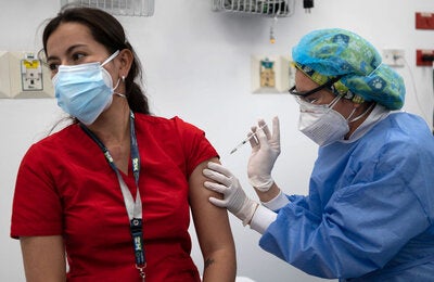 Health worker gets vaccinated 
