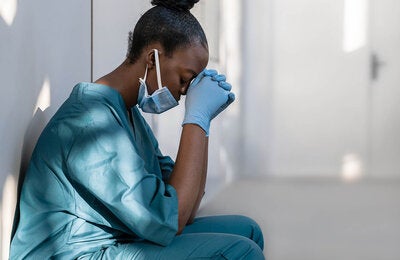 Exhausted health care worker