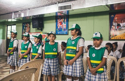 Children Volunteer: This group of girls volunteer at their Cruzada Social Technical Institute of Barranquilla making sure  that it stay free of mosquitoes that transmit dengue, chikungunya and zika. Everyday they review the perimeter of the school to ensure the proper disposal of mosquito breeding sites.