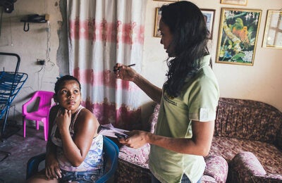 Health in my house: Los caminantes de la salud—Hikers for Health in Barranquilla visit families in their homes, educating on how to prevent diseases and how to use health services. When they detect a health risk, they make a referral to the nearest health center.