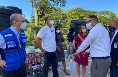 Guided by Mr. Garfield Wood from design and inspection firm GW Architects, Jamaica’s Minister of State, Ministry of Finance & the Public Services, Member of Parliament, North East St. Ann, Hon. Marsha Smith, Minister of Health & Wellness, Dr. the Hon. Christopher Tufton, MP, Her Excellency Judith Slater, British High Commissioner to Jamaica and Mr. Ian Stein, PAHO/WHO Representative in Jamaica are touring the St. Ann’s Bay Smart Health Centre as part of the official handover ceremony.