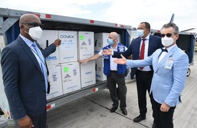 Dr. the Hon. Christopher Tufton, Minister of Health and Wellness, Senator the Hon. Leslie Campbell, State Minister in the Ministry of Foreign Affairs and Foreign Trade, His Excellency Olivier Guyonvarch, Ambassador of the French Republic to Jamaica and Mr. Ian Stein, PAHO/WHO Representative to Jamaica, Bermuda and the Cayman Islands were on hand to witness the arrival of the first shipment at the Norman Manley International Airport in Kingston.