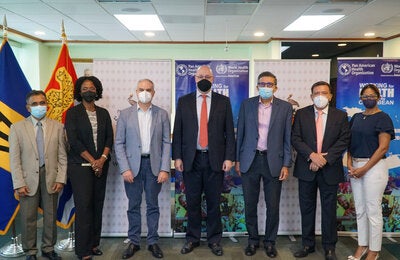 Representatives from PAHO and UWI at the launch event.