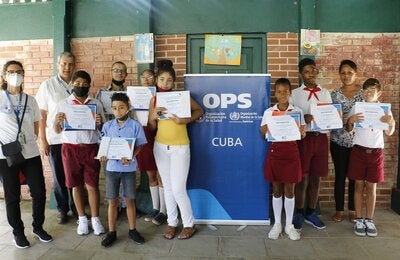 Niñas y niños premiados en concursos infantiles por 120 años de OPS