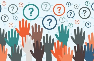 Raised hands of multiple colors