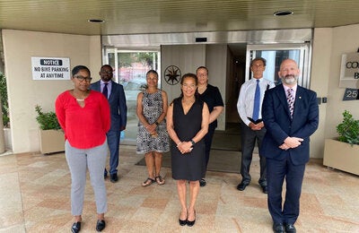 Mr Ian Stein (front right) poses with key members of the Ministry of Health