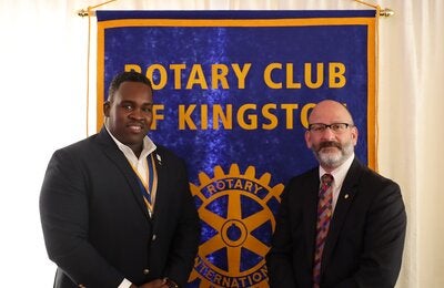 Mr. Ian Stein, Pan American Health Organization/ World Health Organization Representative to Jamaica, Bermuda and the Cayman Islands (right) paused to greet Karsten Johnson, President of the Rotary Club of Kingston after his lunchtime presentation on polio and NCDs