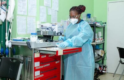 Nurse Samanta Toney working in the COVID-19 Intensive Care Unit in 's Lands Hospital in Suriname.