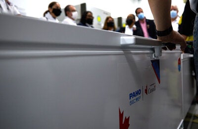 Vaccines are transported in coolers.