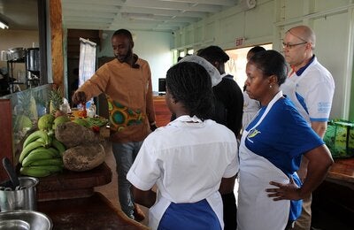 The competitors hearing the rules of the cook-off