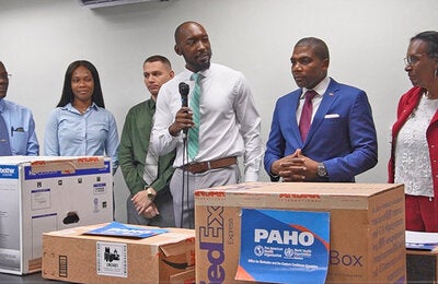 Officials at equipment donation