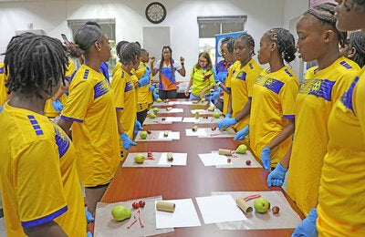 Adolescent girls participating in an educational exercise