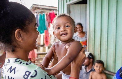 Mother and child smiling