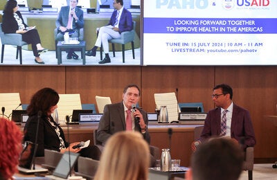 paho director speaking at the meeting