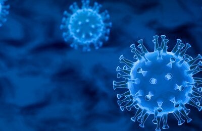 Imagen esquemática de virus de la familia Corona en color azul