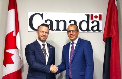 (L_R)  His Excellency Michael Callan - Canadian High Commissioner to Trinidad and Tobago , Dr. Gabriel Vivas Francesconi - PAHO/WHO Representative for Trinidad and Tobago and the Dutch Caribbean Islands