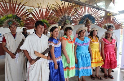 Two men and five women, member of the Information Analysis Committee, Indigenous Network, Cochabamba Tropic region pose for the camera. 