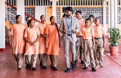 girls and boy in school setting