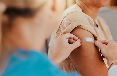 Vacccinated patient gets a band aid