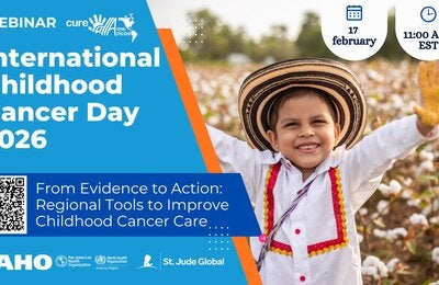 a boy raising his hands