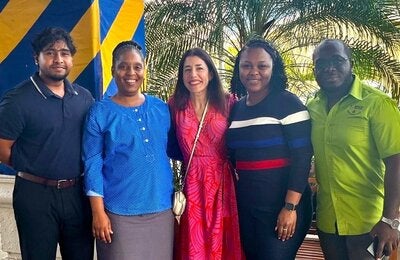 Dr. Nathalie El Omeiri, Advisor for Antimicrobial Resistance Response, alongside training participants from Jamaica’s National Laboratory Services.