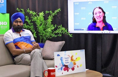 Prabhjot Singh and Fiona Anthony on set discussing event-based surveillance