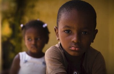 Two children looking at the camera.