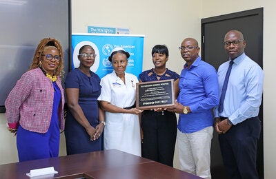 Handover the Baby-Friendly Hospital accreditation plaque to officials in Grenada