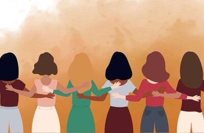women together holding hands