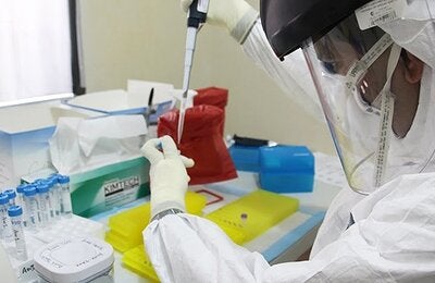 Man in lab with blood sample