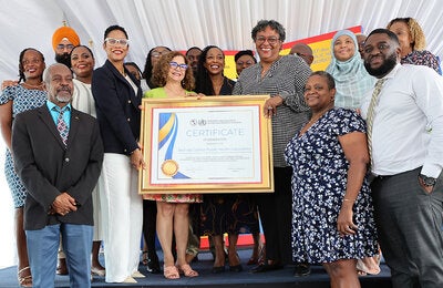 Group photo Barbados Best-dos Santos laboratory ceremony - PAHO/WHO Collaborating Centre designation