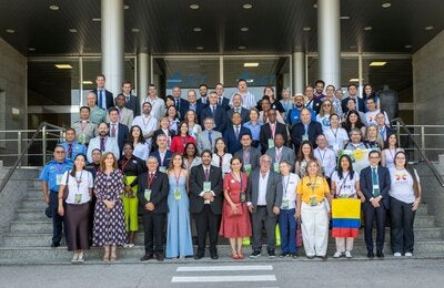 Participants in the OISEVI meeting pose for a group photo on the steps outside the headquarters of Spain’s Directorate-General for Traffic (DGT) in Madrid.