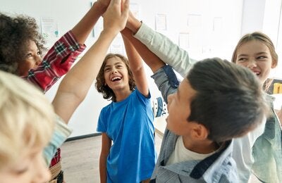 adolescents playing with hands in air