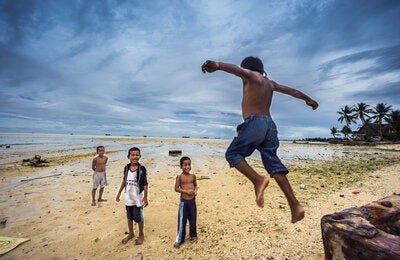 beach water retreat boys at play