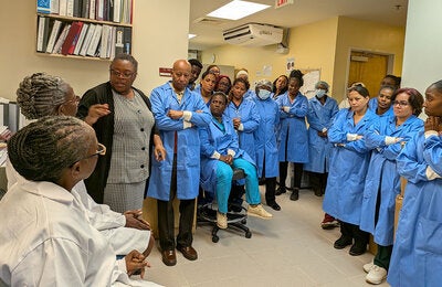 Assessment team with laboratory staff