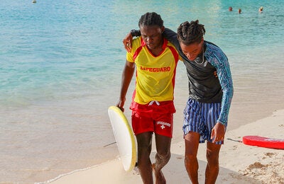 Lifeguard saves person at the beach