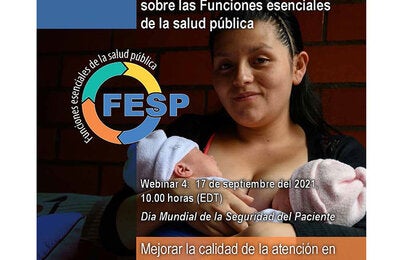 Madre cargando a gemelos