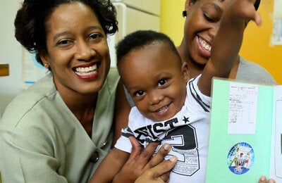 Nurse with mother and child