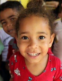 Children participating in Vaccination Week campaigns in Brazil
