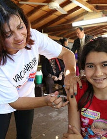 Girl getting vaccinated