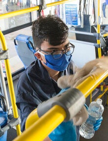 Young man riding the bus